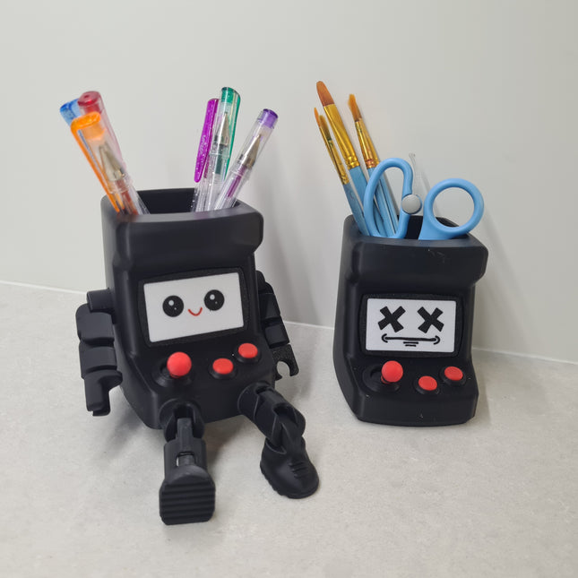 one flexy arcade buddy with smile face and one origional arcade buddy with cross eye face