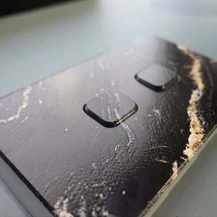 Clipsal Iconic Coverplate with black gold marble close up