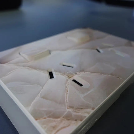 Close up of clipsal iconic coverplate printed with marble stone