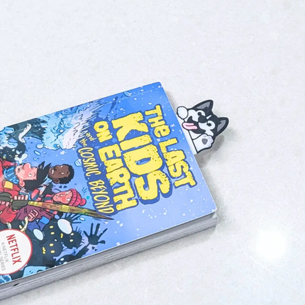3d printed bookmark of a husky design in a book