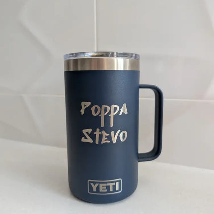 Blue YETI mug with 'Poppa Stevo' text engraved on a white background