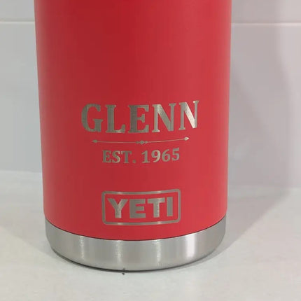 Red YETI tumbler with 'Glenn Est. 1965' engraving on a white background