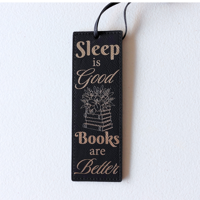 black leather Bookmark with text 'Sleep is Good, Books are Better' engraved in gold 